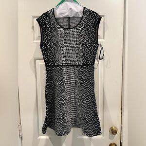 Black & white animal print sleeveless dress BCBG w/ decorative back zipper.